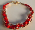 B-NV 02: Pulsera dorada con cola de ratòn roja