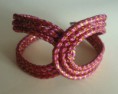B-NV 10: pulsera de cordòn rosa y dorado